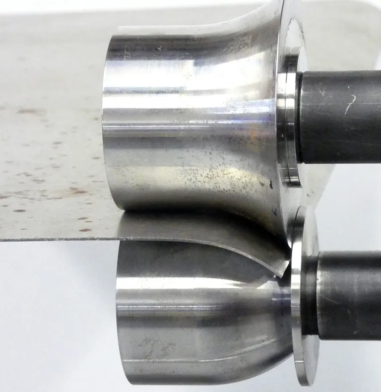 Radiusruller for sikkemaskin