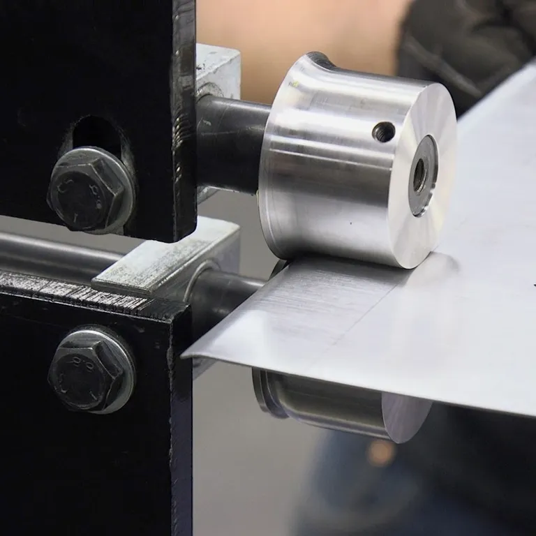 Radiusruller for sikkemaskin